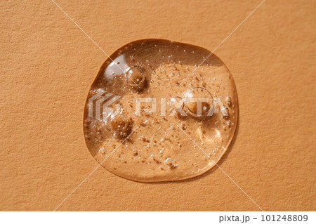 A drop of cosmetic gel on a beige background. 101248809