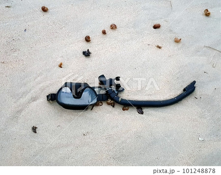 snorkeling glasses on the sand in beach 101248878