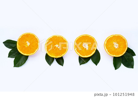 Orange fruit with green leaves on white background. Orange fruit with green leaves on white background. 101251948