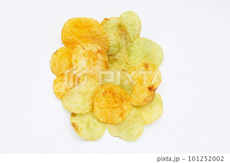 Potato chips on white background. 101252002