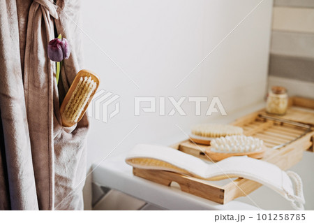Body cleanse, how to detox body and skin. Spa wellness beauty treatments at home. Spa wooden tools and detox brushes Massagers at bathroom 101258785
