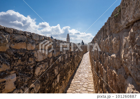 Old stone walls of ancient town 101260887