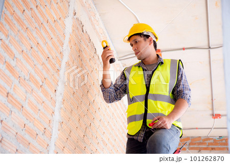 Young engineer caucasian man repair electricity at house. 101262870