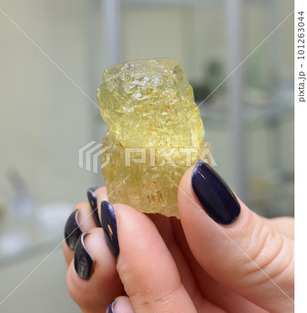 Clouse-up of yellow beryl mineral found in Europe in Norway 101263044