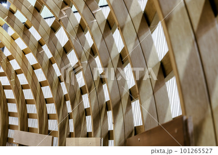 The Interior of Curved Diagonal Lines are made of the Wooden Composite with the Facade Design Architecture. 101265527