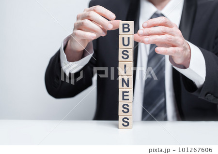 Tower of wooden blocks with black word business. Tower of wooden blocks with black word business. 101267606