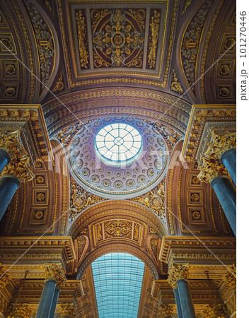 Versailles castle architecture details inside the Gallery of Great Battles hall, the largest room of the sun king Louis XIV palace. Golden ornaments and decor, marble columns and glass ceiling 101270446