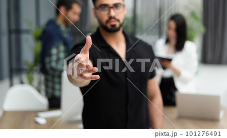 business man offering handshake in office acquisition concept. 101276491