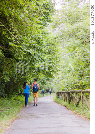 Unrecognizable mixed race mid couple ecotourism hiking in senda del oso, Asturias conservation Unrecognizable mixed race mid couple ecotourism hiking in senda del oso, Asturias conservation 101277000