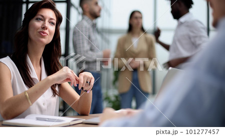 Young speaker interviewing new partners in the office Young speaker interviewing new partners in the office 101277457