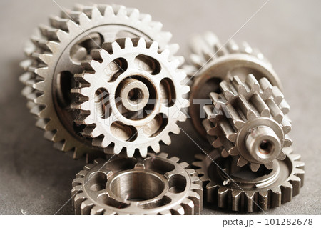 Metal gear wheel engine car and bike, mechanic industry concept. Metal gear wheel engine car and bike, mechanic industry concept. 101282678