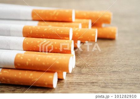 Cigarette, roll tobacco in paper with filter tube, No smoking concept. Cigarette, roll tobacco in paper with filter tube, No smoking concept. 101282910