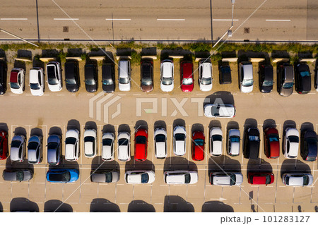 Top view of wide road with markings and lots of cars at day 101283127
