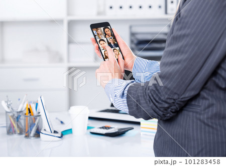 Businesswoman using smartphone 101283458