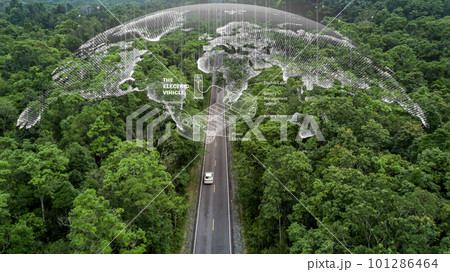 Electric vehicle car going through forest, EV electrical energy for environment, Nature power technology sustainable devlopment goals green energy, Ecosystem ecology healthy environment road trip 101286464