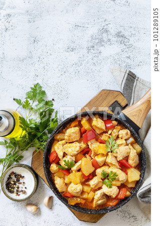 Stir-fried Taiwanese sliced Chicken breast with pineapple and pepper bell. Homemade delicious food in Taiwan on a stone tabletop. View from above. Copy space. 101289105