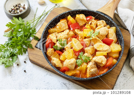 Stir-fried Taiwanese sliced Chicken breast with pineapple and pepper bell. Homemade delicious food in Taiwan on a stone tabletop. Stir-fried Taiwanese sliced Chicken breast with pineapple and pepper bell. Homemade delicious food in Taiwan on a stone tabletop. 101289108