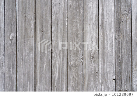 Old Wooden planks background wall. Textured rustic wood old paneling for walls, interiors and construction. Old Wooden planks background wall. Textured rustic wood old paneling for walls, interiors and construction. 101289697