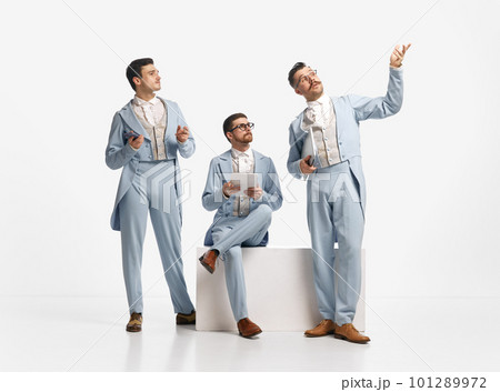 Shot of three men, friends wearing old style...の写真素材 ...