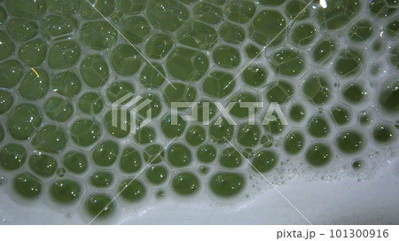 Soap bubbles in a tub of water, macro photo Soap bubbles in a tub of water, macro photo 101300916