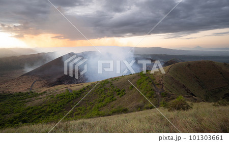 Landscape with active volcano 101303661