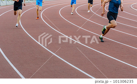 runner leader run ahead of sprint race on turn stadium track, summer athletics championship runner leader run ahead of sprint race on turn stadium track, summer athletics championship 101306235