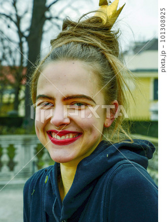 Young woman (girl) with make-up of a fairy-tale forest character - goblin Young woman (girl) with make-up of a fairy-tale forest character - goblin 101308925