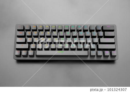Realistic computer keyboard with black chrome texture isolated on dark Realistic computer keyboard with black chrome texture isolated on dark 101324307