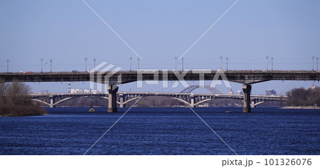 Kiev, Ukraine March 13, 2020: Paton Bridge over the Dnieper River, aging, rusting and requiring repair Kiev, Ukraine March 13, 2020: Paton Bridge over the Dnieper River, aging, rusting and requiring repair 101326076