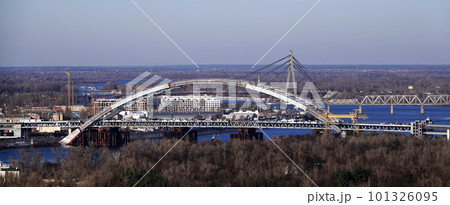 Kiev, Ukraine July 12, 2019: Podolsky bridge on Trukhanov island in the city of Kiev Ukraine Kiev, Ukraine July 12, 2019: Podolsky bridge on Trukhanov island in the city of Kiev Ukraine 101326095