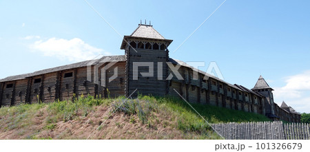 Kiev, Ukraine June 19, 2021: old wooden fortress - entertainment complex Kievan Rus old wooden fortress and artists doing a performance. 101326679