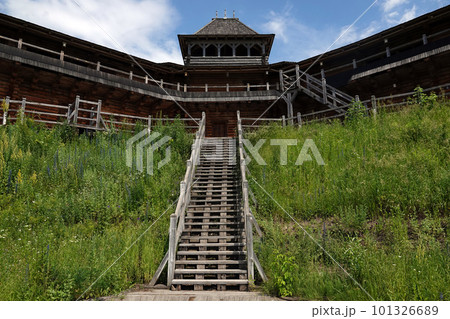 Kiev, Ukraine June 19, 2021: old wooden fortress - entertainment complex Kievan Rus old wooden fortress and artists doing a performance. Kiev, Ukraine June 19, 2021: old wooden fortress - entertainment complex Kievan Rus old wooden fortress and artists doing a performance. 101326689
