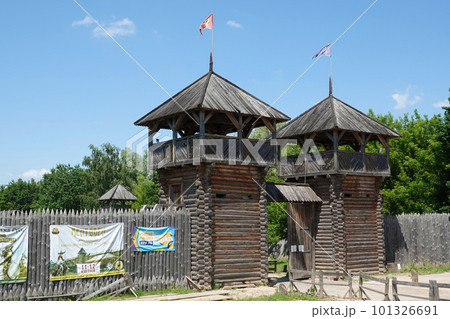 Kiev, Ukraine June 19, 2021: old wooden fortress - entertainment complex Kievan Rus old wooden fortress and artists doing a performance. Kiev, Ukraine June 19, 2021: old wooden fortress - entertainment complex Kievan Rus old wooden fortress and artists doing a performance. 101326691
