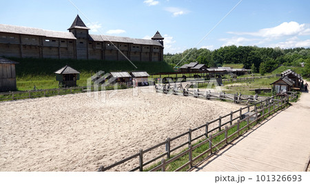 Kiev, Ukraine June 19, 2021: old wooden fortress - entertainment complex Kievan Rus old wooden fortress and artists doing a performance. Kiev, Ukraine June 19, 2021: old wooden fortress - entertainment complex Kievan Rus old wooden fortress and artists doing a performance. 101326693