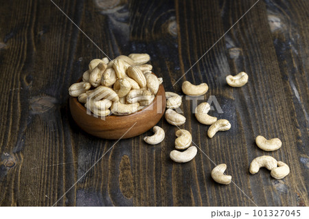 Fresh peeled cashew nuts on the table Fresh peeled cashew nuts on the table 101327045