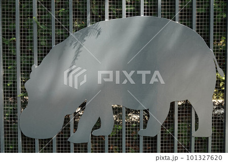 Kiev, Ukraine July 6, 2021: Artistic decoration of the facade of the fence with images of zoo animals in the center of Kiev 101327620