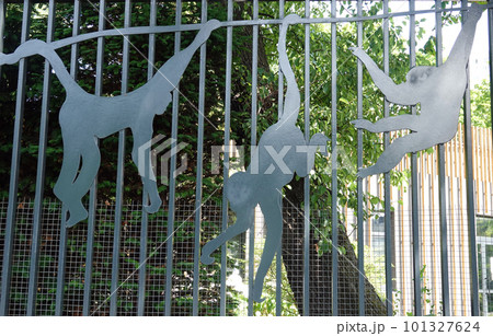 Kiev, Ukraine July 6, 2021: Artistic decoration of the facade of the fence with images of zoo animals in the center of Kiev 101327624