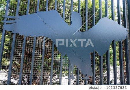 Kiev, Ukraine July 6, 2021: Artistic decoration of the facade of the fence with images of zoo animals in the center of Kiev 101327628