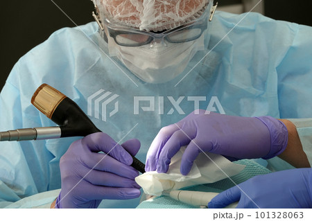Kiev, Ukraine August 22, 2020: Dentist doctor works with a patient close-up 101328063