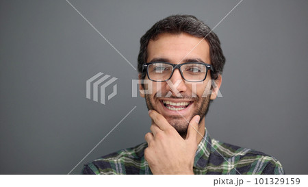 Close up portrait of middle age man with glasses smiling Close up portrait of middle age man with glasses smiling 101329159