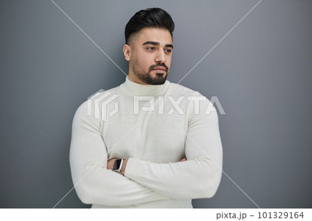 Portrait of stylish middle aged man posing on gray background Portrait of stylish middle aged man posing on gray background 101329164
