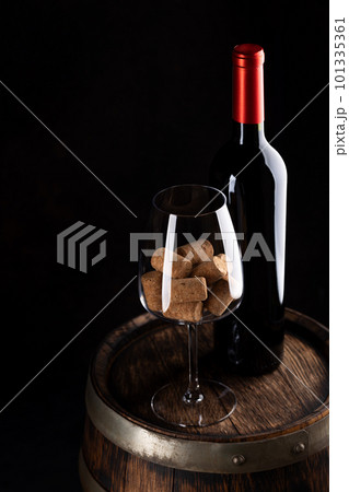 Red wine bottle, barrel and wine glass with corks Red wine bottle, barrel and wine glass with corks 101335361