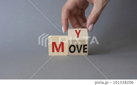 My Move symbol. Businessman hand Turnes cubes with words My Move. Beautiful grey background. Business and My Move concept. Copy space 101338206