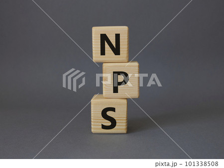 NPS - Net Promoter Score symbol. Wooden cubes with words NPS. Beautiful grey background. Business and NPS concept. Copy space. NPS - Net Promoter Score symbol. Wooden cubes with words NPS. Beautiful grey background. Business and NPS concept. Copy space. 101338508