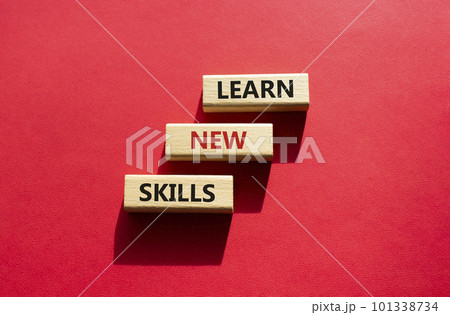 Learn new skills symbol. Concept words Learn new skills on wooden blocks. Beautiful red background. Business and Learn new skills concept. Copy space. Learn new skills symbol. Concept words Learn new skills on wooden blocks. Beautiful red background. Business and Learn new skills concept. Copy space. 101338734