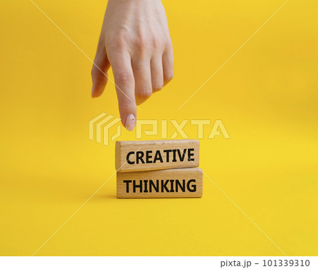 Creative thinkig symbol. Wooden blocks with words Creative thinkig. Businessman hand. Beautiful yellow background. Business and Creative thinkig concept. Copy space. Creative thinkig symbol. Wooden blocks with words Creative thinkig. Businessman hand. Beautiful yellow background. Business and Creative thinkig concept. Copy space. 101339310