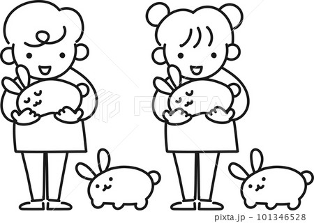 ウサギを抱っこする笑顔の女の子と男の子 101346528