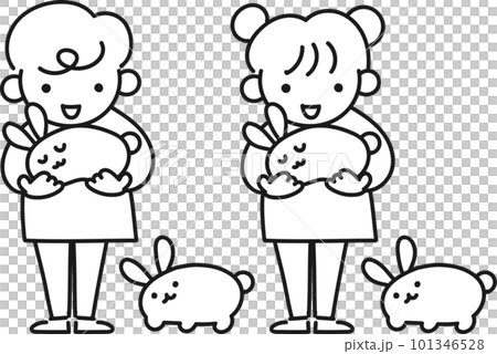 ウサギを抱っこする笑顔の女の子と男の子 101346528