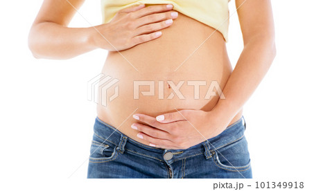 Pregnant woman, stomach and hands with studio background for body, maternity wellness and healthcare. Closeup abdomen, beauty and pregnancy of mother for skincare, healthy life and white background Pregnant woman, stomach and hands with studio background for body, maternity wellness and healthcare. Closeup abdomen, beauty and pregnancy of mother for skincare, healthy life and white background 101349918