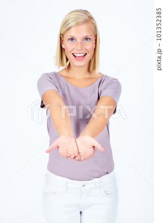Portrait, product and open hands with a model woman in studio isolated on a white background for marketing. Hands, advertising and brand with a female posing on blank branding space for a logo 101352385